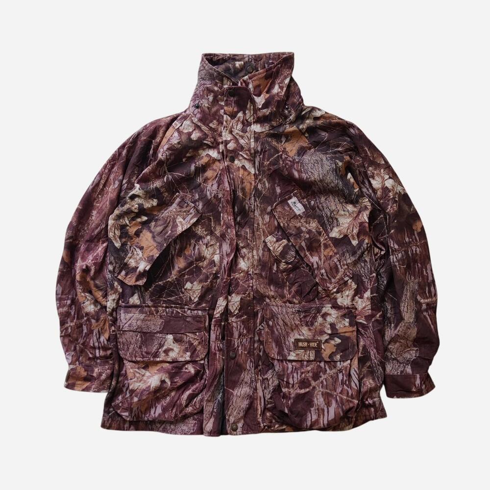 Mountain camo jacket with multiple pockets and a high collar